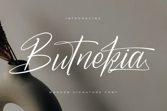 Butnekia Font: Elegant Script for Handmade Labels